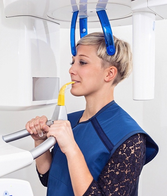 Woman using 3D cone beam scanning technology 