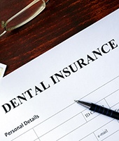 Dental insurance form resting on a table