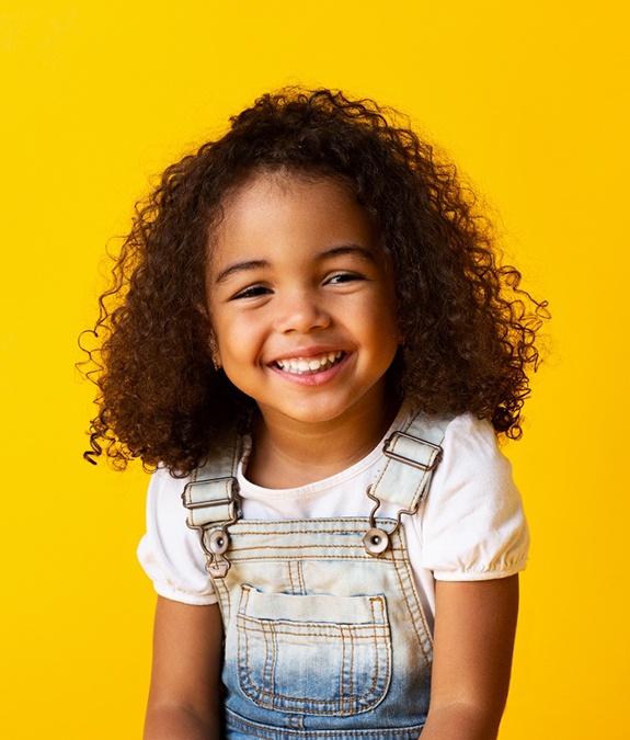 Portrait of happy, smiling young girl