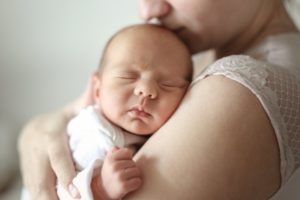 baby that has undergone tongue-tie treatment through a frenectomy