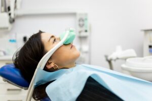Patient receiving dental sedation.